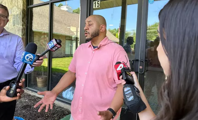 Pastor Bobby Kelly of CrossPointe Community Church in Wayne, Mich., speaks to reporters on June 23, 2025. (AP Photo/Ed White)