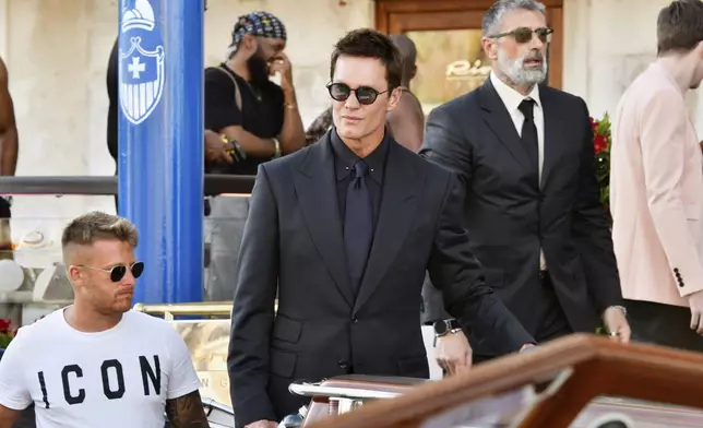 Tom Brady leaves a hotel ahead of the anticipated wedding celebrations of Jeff Bezos and Lauren Sanchez, in Venice, Italy, Friday, June 27, 2025. (AP Photo/Luigi Costantini)