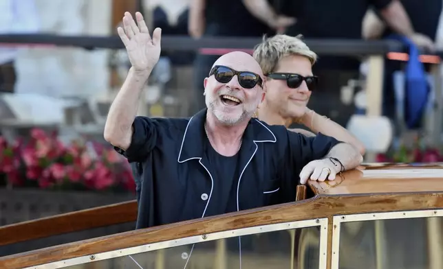 Domenico Dolce leaves a hotel during celebrations for Jeff Bezos and Lauren Sanchez Bezos' wedding, in Venice, Saturday, June 28, 2025. (AP Photo/Luigi Costantini)