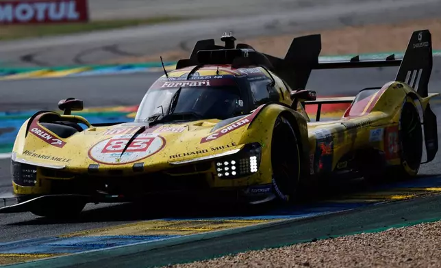 AF Corse car (starting no. 83) a Ferrari 499P with Robert Kubica of Poland, Yifei Ye of China and Phil Hanson of Great Britain races during the 24-hour Le Mans endurance race, Sunday June 15, 2025 in Le Mans, western France. (AP Photo/Jeremias Gonzalez)