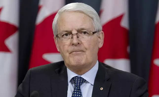 FILE - Transport Minister Marc Garneau speaks during a news conference in Ottawa, Ontario, March 13, 2019. (Adrian Wyld/The Canadian Press via AP, File)