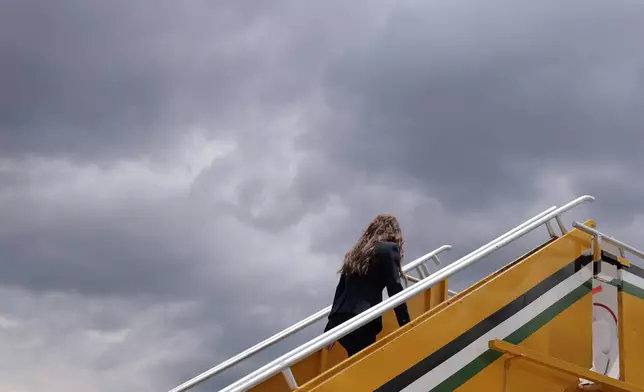 U.S. Homeland Security Secretary Kristi Noem boards a plane after touring the Department of Homeland Security operations at La Aurora International Airport, in Guatemala City, Thursday, June 26, 2025. (Anna Moneymaker/Pool Photo via AP)