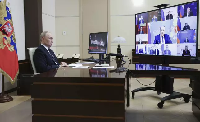 Russian President Vladimir Putin chairs a cabinet meeting via videoconference at Novo-Ogaryovo state residence outside of Moscow, Russia, Wednesday, June 4, 2025. (Gavriil Grigorov, Sputnik, Kremlin Pool Photo via AP)