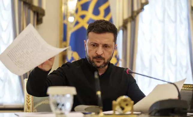 Ukrainian President Volodymyr Zelenskyy speaks to journalists during a press conference in Kyiv, Ukraine, on Wednesday, June 4, 2025. (AP Photo/Evgeniy Maloletka)