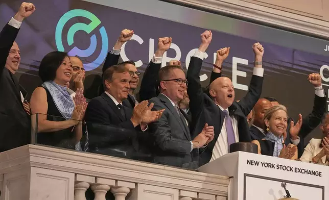 Jeremy Allaire, second from right, Co-Founder, Chairman &amp; CEO of Circle, rings the New York Stock Exchange opening bell, Thursday, June 5, 2025. (AP Photo/Richard Drew)