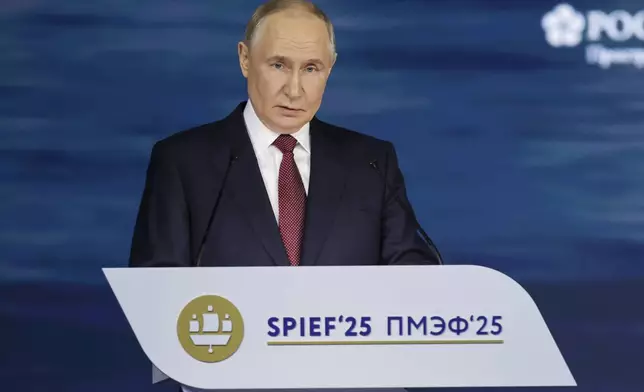In this photo released by the Roscongress Foundation, Russian President Vladimir Putin speaks at a plenary session of the St. Petersburg International Econimic Forum in St. Petersburg, Russia, Friday, June 20, 2025. (Vyacheslav Viktorov/ Roscongress Foundation via AP)
