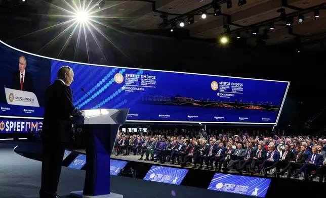 Russian President Vladimir Putin speaks at a plenary session of the St. Petersburg International Econimic Forum in St. Petersburg, Russia, Friday, June 20, 2025. (Gavriil Grigorov, Sputnik, Kremlin Pool Photo via AP)