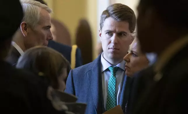 FILE -FILE - In this March 5, 2019, photo, Sen. Rob Portman, R-Ohio, left, talks with Homeland Security Secretary Kirstjen Nielsen, right, and her chief of staff Miles Taylor depart after the Republican Caucus luncheon on Capitol Hill in Washington. (AP Photo/Alex Brandon), File)