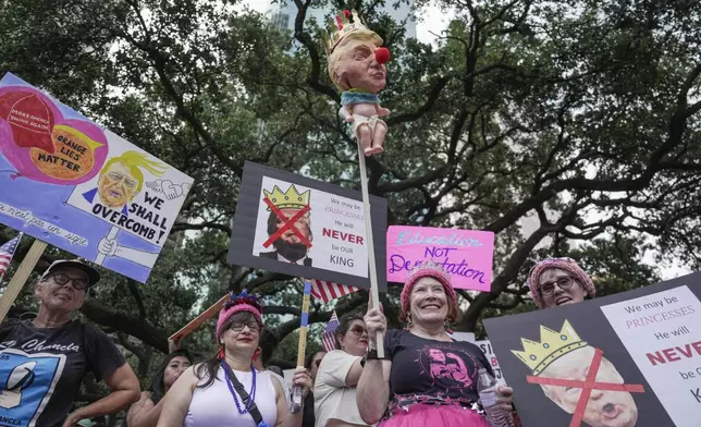 People gather in Houston for the "No Kings" nationwide demonstration on Saturday, June 14, 2025. (Raquel Natalicchio/Houston Chronicle via AP)