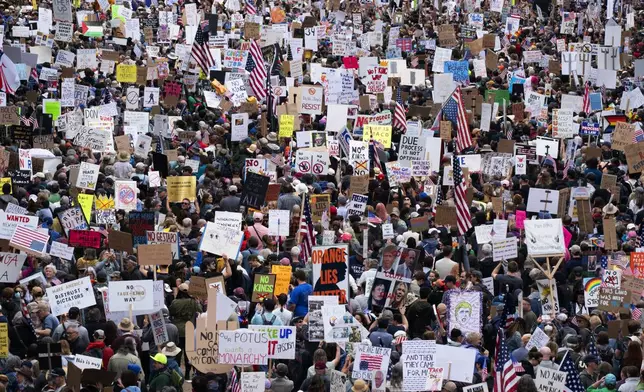 Demonstrators gather for multiple "No Kings" protests in Portland, Ore., on Saturday, June 14, 2025. (Beth Nakamura/The Oregonian via AP)