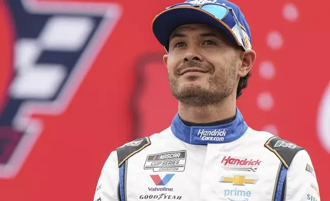 Kyle Larson is introduced to fans prior to a NASCAR Cup Series auto race at Charlotte Motor Speedway, Sunday, May 25, 2025, in Concord, N.C. (AP Photo/Matt Kelley)