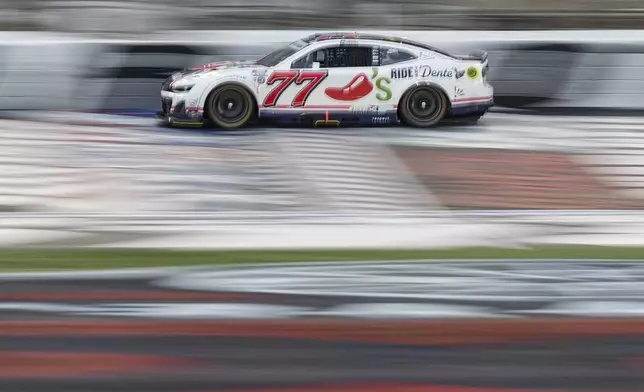 Carson Hocevar steers down the front stretch during a NASCAR Cup Series auto race at Charlotte Motor Speedway, Sunday, May 25, 2025, in Concord, N.C. (AP Photo/Matt Kelley)
