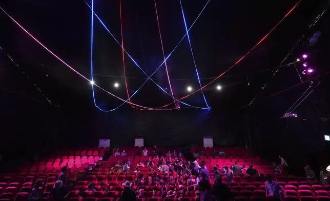 Spectators arrive at the big top of Dongchoon Circus Troupe in Ansan, South Korea, Tuesday, June 10, 2025. (AP Photo/Lee Jin-man)