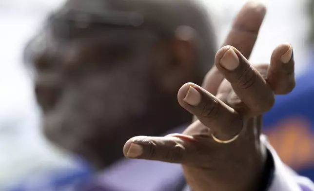 Rev. Robert Thompson says a prayer during a Juneteenth celebration at the African Burying Ground Memorial Park Thursday, June 19, 2025, in Portsmouth, N.H. (AP Photo/Michael Dwyer)