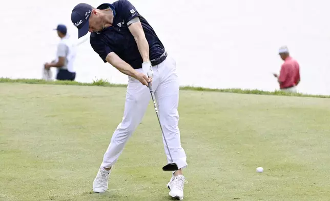 Justin Thomas tees off the 18th hole during the second round of the Travelers Championship golf tournament at TPC River Highlands, Friday, June 20, 2025, in Cromwell, Conn. (AP Photo/Jessica Hill)