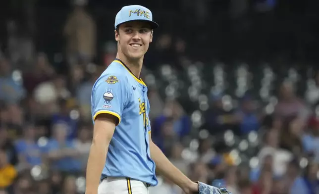 Milwaukee Brewers pitcher Jacob Misiorowski reacts after throwing his first strikeout, against St. Louis Cardinals' Willson Contreras, as he makes his major league debut during the second inning of a baseball game Thursday, June 12, 2025, in Milwaukee. (AP Photo/Kayla Wolf)