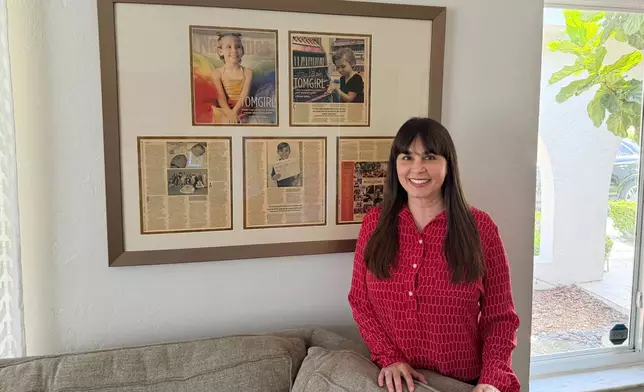Jennifer Solomon, Parents and Families Support Manager for Equality Florida, poses in her home on Wednesday, June 18, 2025 in Pinecrest, Fl., after the Supreme Court upheld Tennessee’s ban on gender-affirming care for transgender minors. (AP Photo/Daniel Kozin)