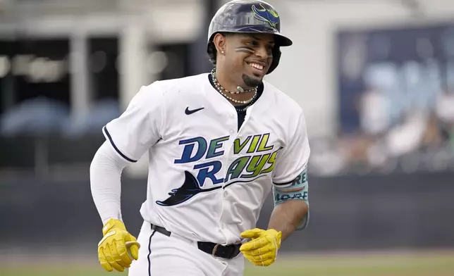 Tampa Bay Rays' Christopher Morel rounds the bases after his home run during the seventh inning of a baseball game against the Detroit Tigers Saturday, June 21, 2025, in Tampa, Fla. (AP Photo/Jason Behnken)