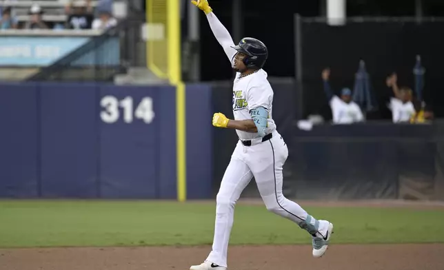 Tampa Bay Rays' Christopher Morel rounds the bases after his home run during the seventh inning of a baseball game against the Detroit Tigers Saturday, June 21, 2025, in Tampa, Fla. (AP Photo/Jason Behnken)