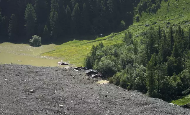 The aftermath of the Birch Glacier collapse is visible in Blatten, Switzerland, June 11, 2025. (AP Photo/Matthias Schrader)
