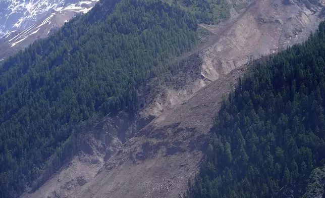 The aftermath of the Birch Glacier collapse is visible in Blatten, Switzerland, June 11, 2025. (AP Photo/Matthias Schrader)