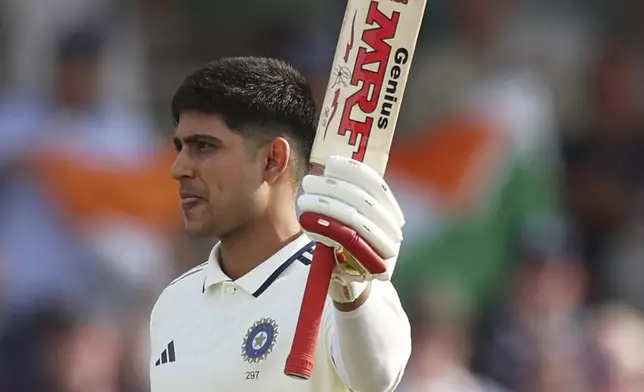 India's captain Shubman Gill celebrates after scoring a century on day one of the first cricket test match between England and India at Headingley in Leeds, England, Friday, June 20, 2025, (AP Photo/Scott Heppell)