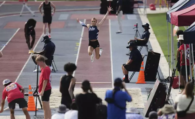 AB Hernandez, a transgender student at Jurupa Valley High School, competes in the long jump at the California high school track-and-field championships in Clovis, Calif., Saturday, May 31, 2025. (AP Photo/Jae C. Hong)