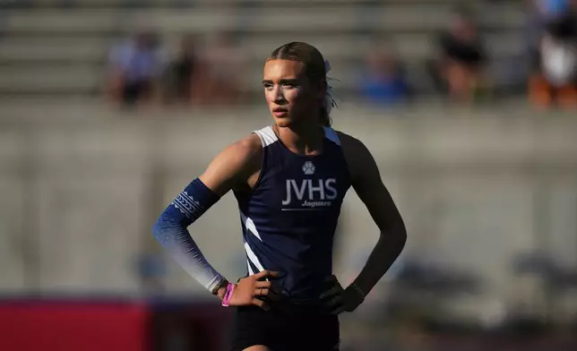 AB Hernandez, a transgender student at Jurupa Valley High School, stands on the field during the California high school track-and-field championships in Clovis, Calif., Saturday, May 31, 2025. (AP Photo/Jae C. Hong)