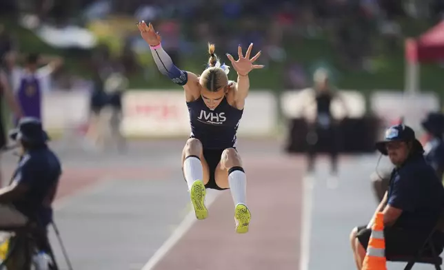 AB Hernandez, a transgender student at Jurupa Valley High School, competes in the long jump at the California high school track-and-field championships in Clovis, Calif., Saturday, May 31, 2025. (AP Photo/Jae C. Hong)