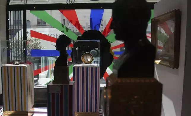 Busts are on display in an exhibition of Napoleon's belongings created by French designer Jean-Charles de Castelbajac at the Sotheby's auction house in Paris Thursday, June 19, 2025 in Paris. (AP Photo/Christophe Ena)