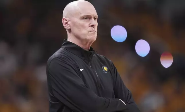 Indiana Pacers head coach Rick Carlisle watches during the first half of Game 3 of the Eastern Conference finals of the NBA basketball playoffs against the New York Knicks Sunday, May 25, 2025, in Indianapolis. (AP Photo/AJ Mast)