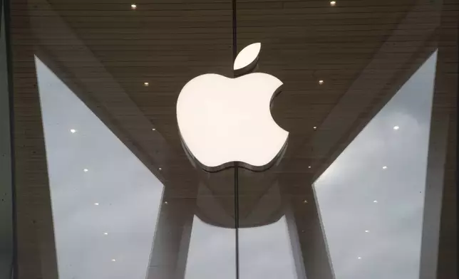 FILE - The Apple logo is displayed at an Apple store, Jan. 3, 2019. (AP Photo/Mary Altaffer, File)