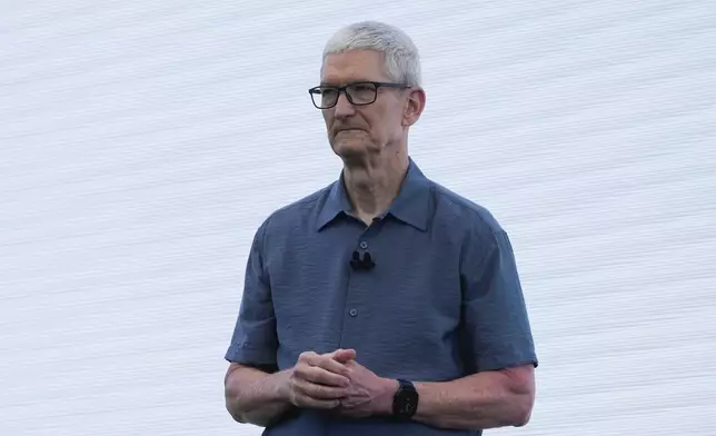 Apple CEO Tim Cook gives a presentation during an event on the Apple campus in Cupertino, Calif., Monday, June 9, 2025. (AP Photo/Jeff Chiu)