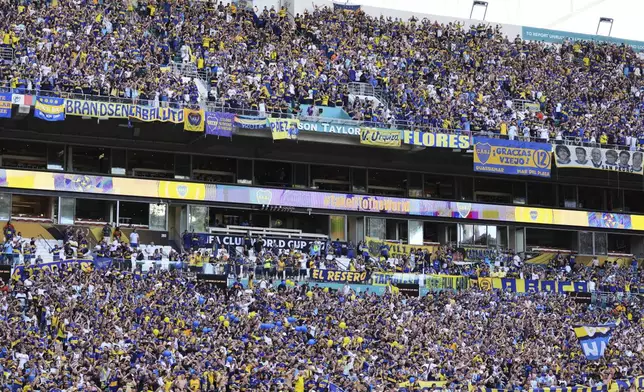 Soccer fans attend the Club World Cup group C soccer match between Boca Juniors and Benfica in Miami Gardens, Fla., Monday, June 16, 2025. (AP Photo/Rebecca Blackwell)