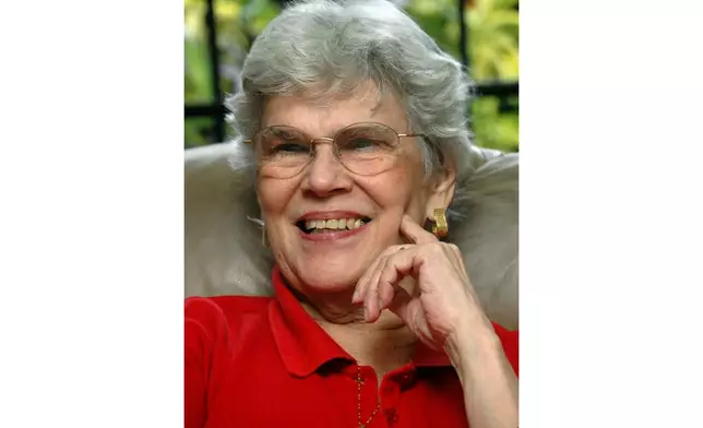 FILE - Former Nicaraguan President Violeta Barrios de Chamorro smiles during an interview at her home in Managua, Oct. 19, 2006. Barrios de Chamorro, a simple housewife thrust into Nicaraguan politics by the assassination of her husband and who, as president, ended a civil war, died on Saturday, June 14, 2025, in San José, Costa Rica, her family said in a statement. She was 95. (AP Photo/Margarita I. Montealegre, File)