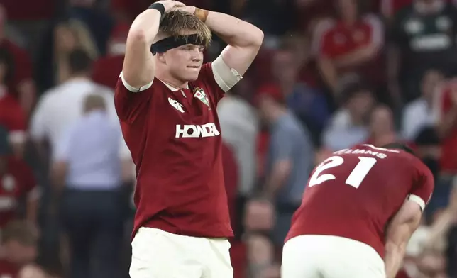Lions' Henry Pollock reacts after his side were defeated in the Rugby Union international match between the British and Irish Lions and Argentina, at the Aviva Stadium in Dublin, Friday, June 20, 2025. (AP Photo/Peter Morrison)