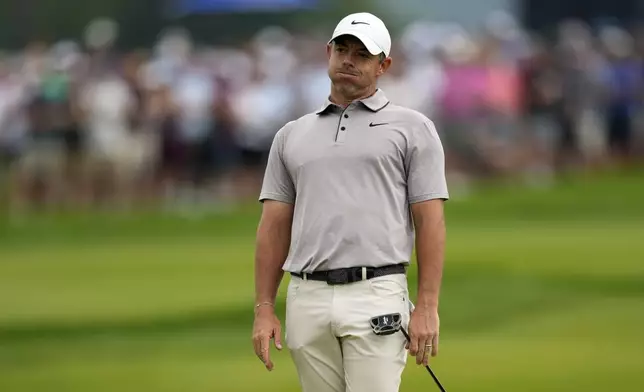Rory McIlroy, of Northern Ireland, reacts after missing a putt on the eighth hole during the third round of the U.S. Open golf tournament at Oakmont Country Club Saturday, June 14, 2025, in Oakmont, Pa. (AP Photo/Carolyn Kaster)