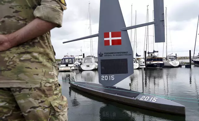 A Saildrone "Voyager", uncrewed surface vehicle (USV), is moored at the Koge Marina in Koge, eastern Denmark, Monday, June 16, 2025. (AP Photo/James Brooks)