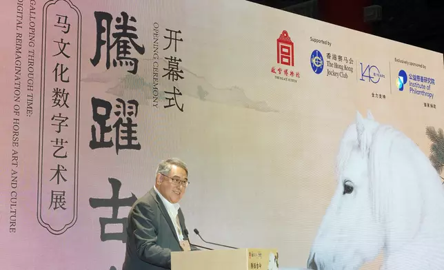 Guests tour the “Galloping Through Time: Digital Reimagination of Horse Art and Culture” exhibition.