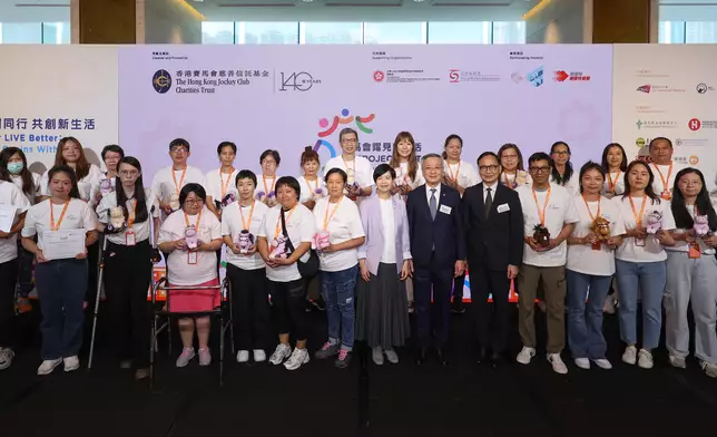 Officiating guests take group photos with JC PROJECT LIFT’s LIFT Ambassadors and beneficiaries.