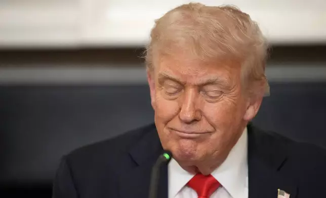 President Donald Trump attends a meeting with the Fraternal Order of Police in the State Dinning Room of the White House, Thursday, June 5, 2025, in Washington. (AP Photo/Alex Brandon)