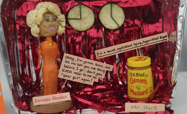 A vegetable sculpture entitled '9 to Chive' on display in the vegetable sculpture competition at Lambeth County show in London, Saturday, June 7, 2025. (AP Photo/Joanna Chan)