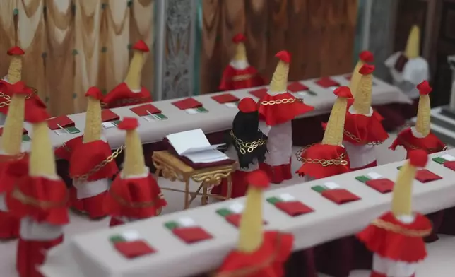 A detail of 'Cornclave", a vegetable sculpture made by Dean Ramsey and Jess Copsey, part of the vegetable sculpture completion at Lambeth County show at Brockwell Park vegetable fair in London, Saturday, June 7, 2025. (AP Photo/Joanna Chan)