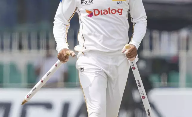 Sri Lanka's Dinesh Chandimal walks off the field after the second cricket test match between Sri Lanka and Bangladesh in Colombo, Sri Lanka, Saturday, June 28, 2025. (AP Photo/Eranga Jayawardena)