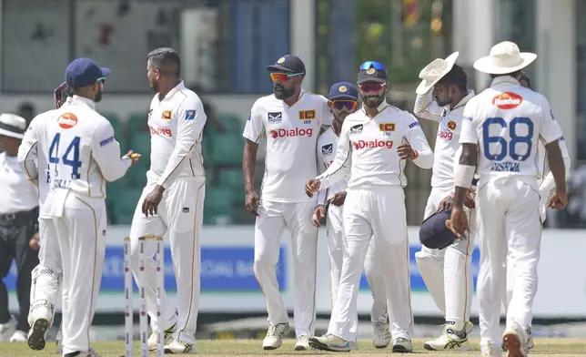 Sri Lankan team members celebrate their win in during the fourth day of the second cricket test match between Sri Lanka and Bangladesh in Colombo, Sri Lanka, Saturday, June 28, 2025. (AP Photo/Eranga Jayawardena)