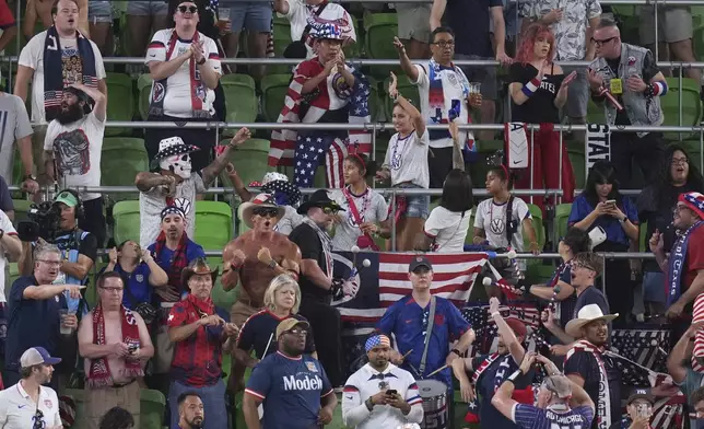 Fans celebrate after United States' Chris Richards scores against Saudi Arabia during a CONCACAF Gold Cup soccer match, Thursday, June 19, 2025, in Austin, Texas. (AP Photo/Eric Gay)