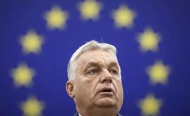FILE - Hungarian Prime Minister Viktor Orban delivers his speech in the hemicycle of the European parliament in Strasbourg, France, Wednesday, Oct. 9, 2024. (AP Photo/Jean-Francois Badias, File)