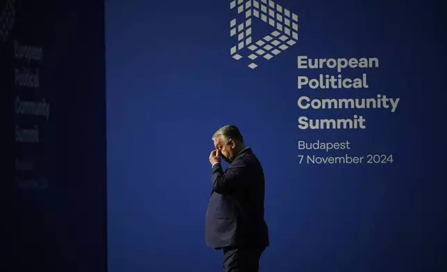 FILE - Hungary's Prime Minister Viktor Orban waits for the arrival of leaders for the European Political Community (EPC) Summit at the Puskas Arena in Budapest, Hungary, Thursday, Nov. 7, 2024. (AP Photo/Petr David Josek, File)