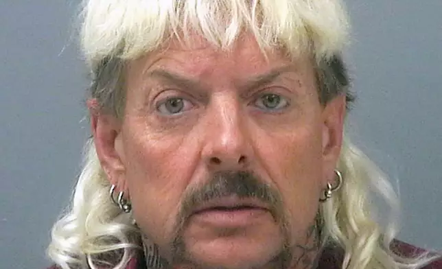 FILE - This photo provided by the Santa Rose County Jail in Milton, Fla., shows Joseph Maldonado-Passage, also known as "Joe Exotic." (Santa Rosa County Jail via AP, File)