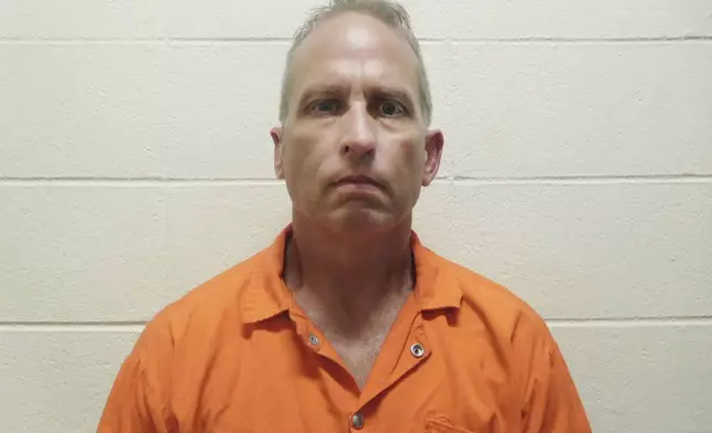 FILE - This booking photo provided by the St. Charles, La., Parish Sheriff's Office shows former DEA agent Chad Scott. (St. Charles Parish Sheriff's Office via AP, File)